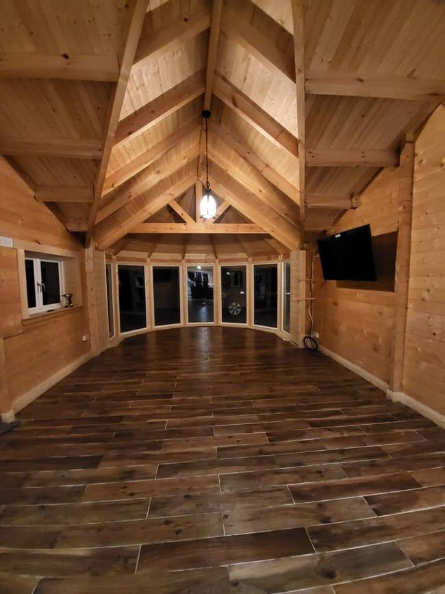 Image of the inside of a log cabin